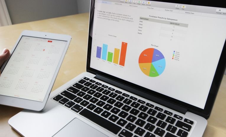 Small business owner designing an email newsletter campaign on a laptop, representing email marketing tips for small businesses