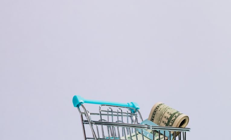 Small business owner setting up an online store on a laptop, representing choosing the right ecommerce platform